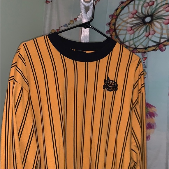 yellow and black striped long sleeve shirt